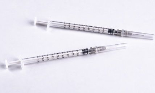 Custom plastic syringe