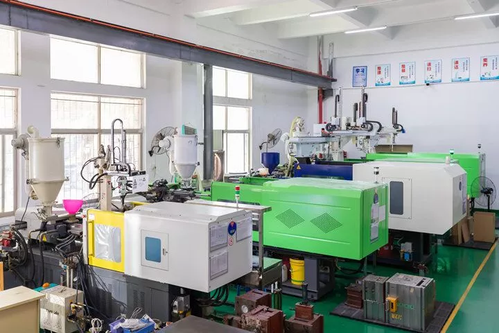 a Clean Injection Molding Room with four big machines