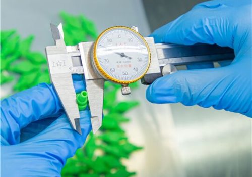 An employee checking the quality of the products